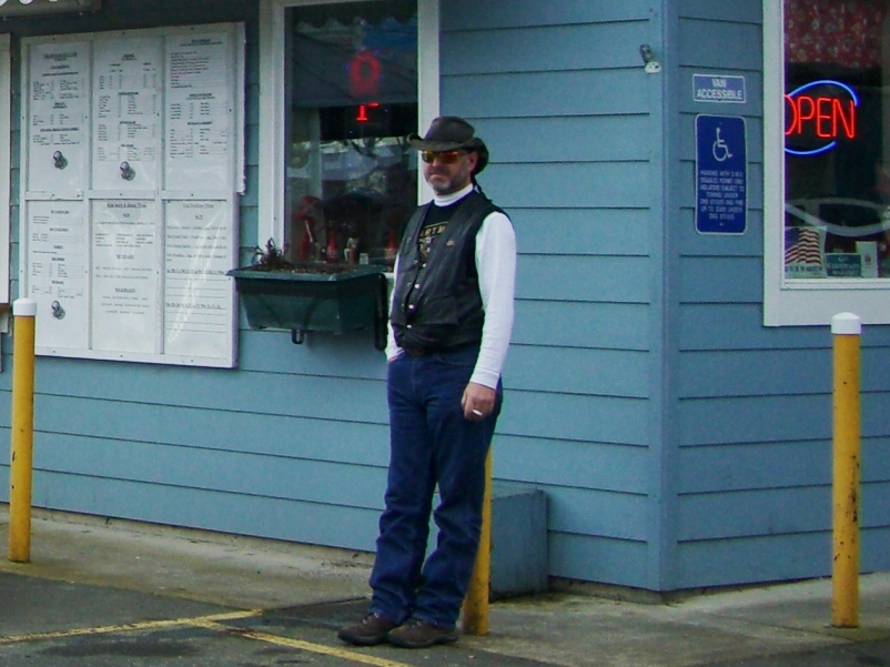 Customer waits at the Burger Hut in Hubbard, Oregon.